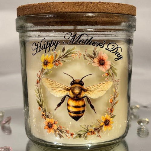 Glass jar with cork lid featuring a bee illustration and 'Happy Mother's Day' text on a white background.